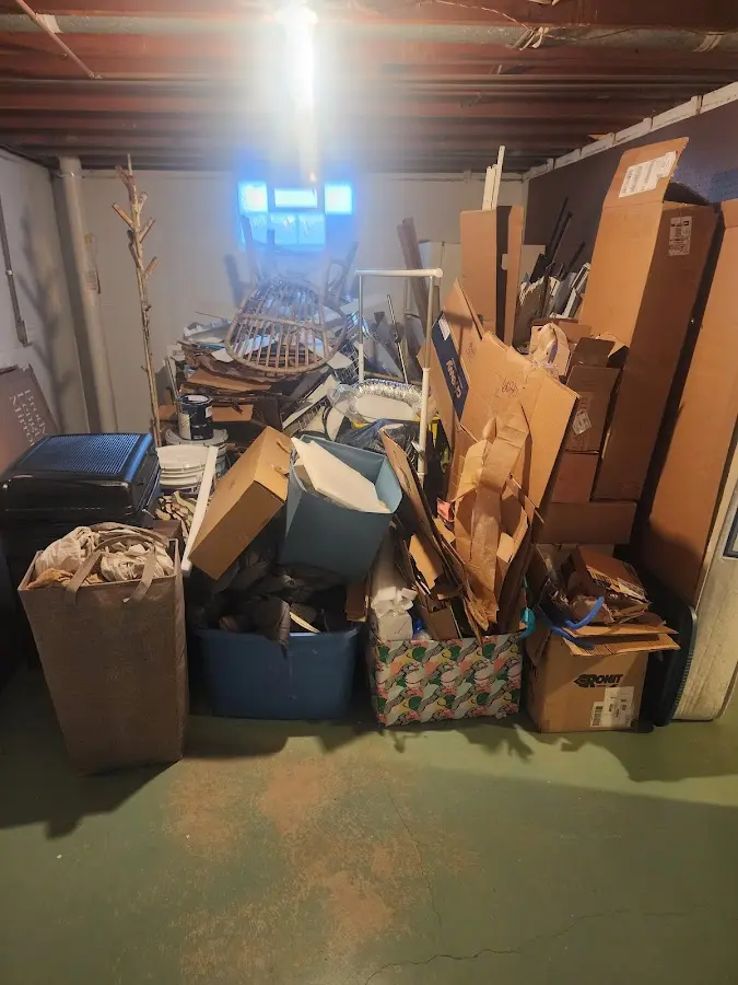 Roll-off dumpster container at job site for 20 Yard Dumpster Rental in Bastrop